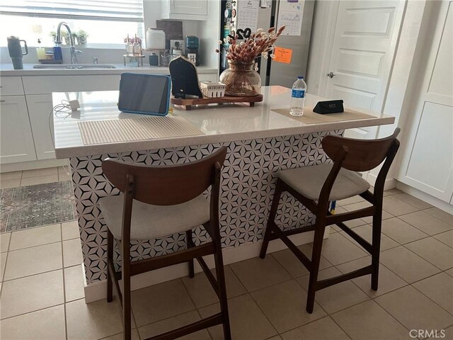 267 N N Magnolia Ave Unit 2, Anaheim, CA 92801 - dining area featuring light tile patterned floors and water heater