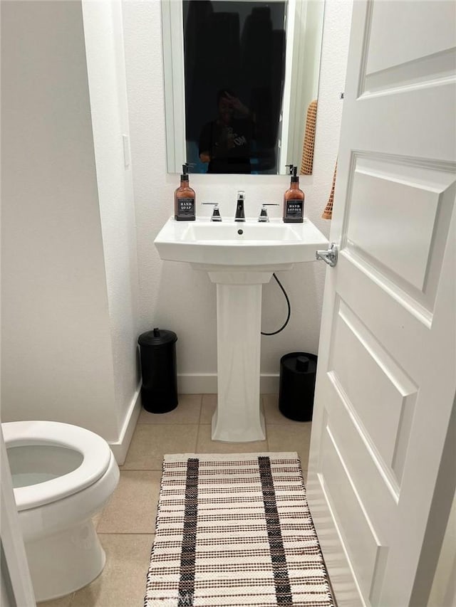 267 N N Magnolia Ave Unit 2, Anaheim, CA 92801 - bathroom with toilet, tile patterned flooring, and baseboards