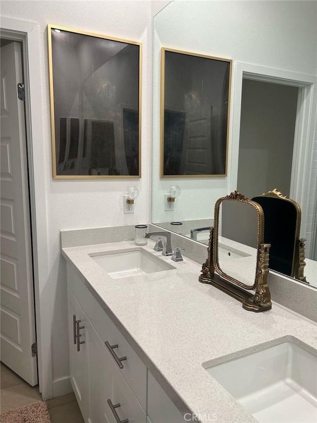 267 N N Magnolia Ave Unit 2, Anaheim, CA 92801 - bathroom featuring tile patterned floors, double vanity, and a sink