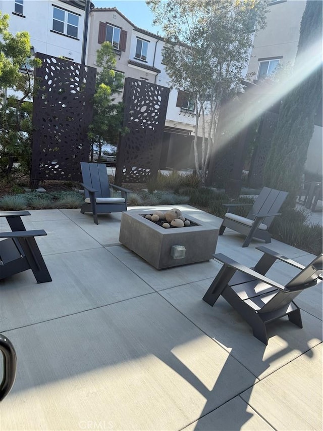267 N N Magnolia Ave Unit 2, Anaheim, CA 92801 - view of patio featuring an outdoor fire pit