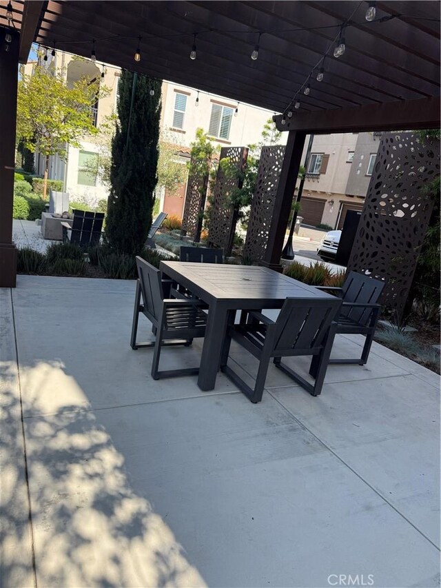 267 N N Magnolia Ave Unit 2, Anaheim, CA 92801 - view of patio with a pergola and outdoor dining space