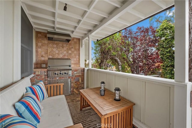 balcony featuring area for grilling