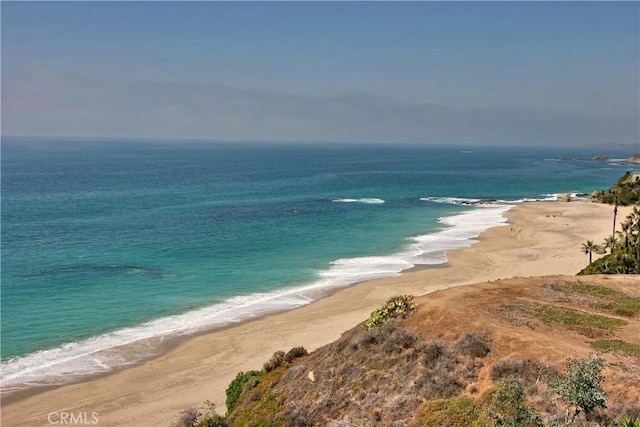 property view of water featuring a beach view
