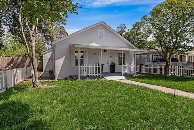 411 A St, Orland, CA 95963 - view of front of home with stucco siding and a porch