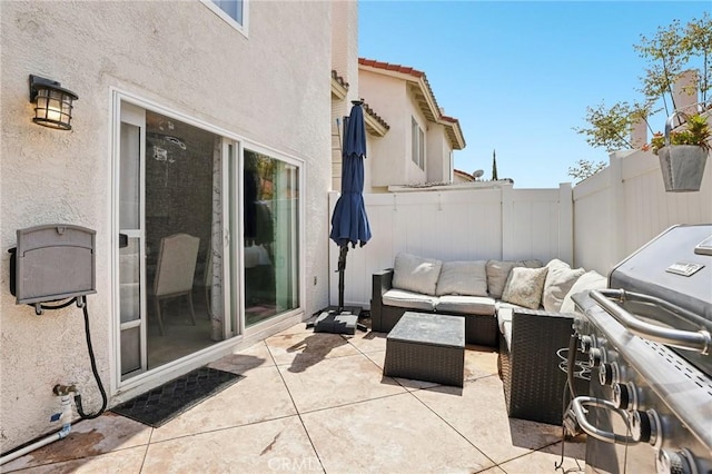 view of patio / terrace with outdoor lounge area, fence, and area for grilling