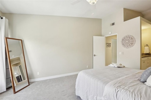 bedroom featuring high vaulted ceiling, carpet, connected bathroom, visible vents, and baseboards