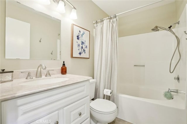 full bath featuring toilet, vanity, and shower / bath combination with curtain