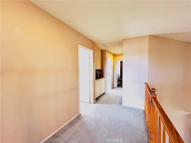 17346 Cold Spring Cir, Riverside, CA 92503 - hallway featuring attic access, an upstairs landing, and light colored carpet