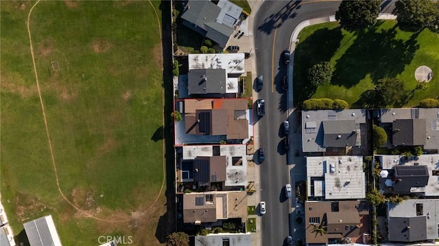 birds eye view of property with a residential view