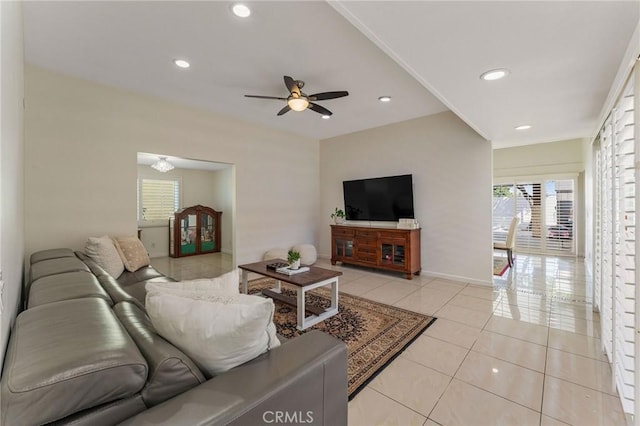 living room featuring a healthy amount of sunlight, light tile patterned flooring, ceiling fan, and recessed lighting