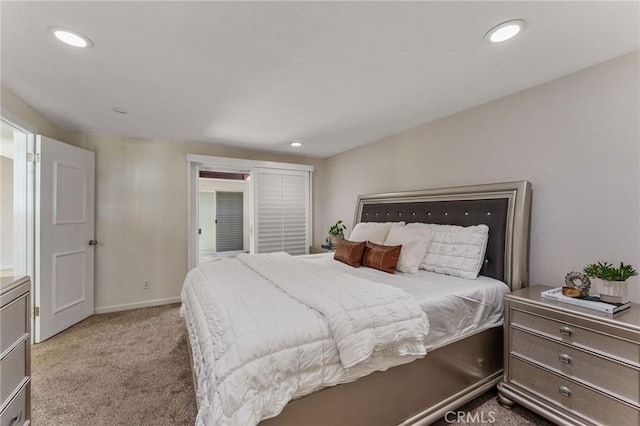 bedroom with carpet flooring, baseboards, and recessed lighting