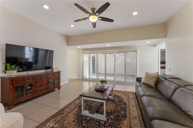 living room with light tile patterned floors, a ceiling fan, and recessed lighting