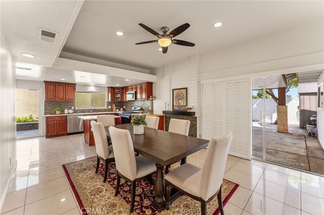dining space featuring visible vents, a wealth of natural light, and recessed lighting