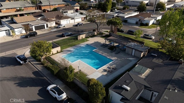 birds eye view of property with a residential view