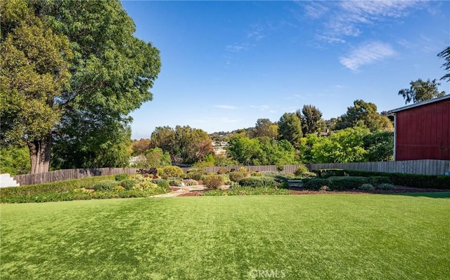 view of yard featuring fence