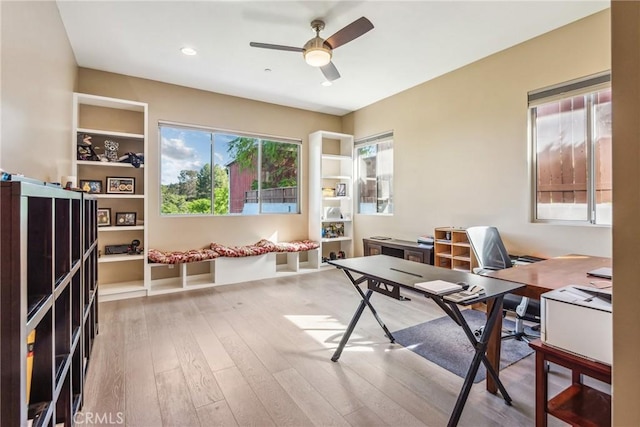 office with recessed lighting, hardwood / wood-style floors, and a ceiling fan