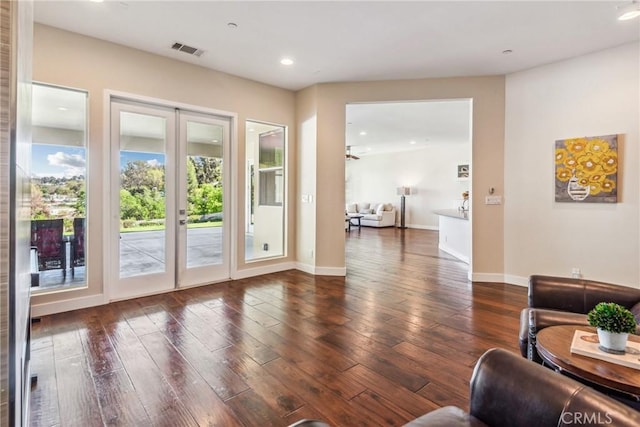 interior space with ceiling fan, visible vents, recessed lighting, french doors, and wood-type flooring