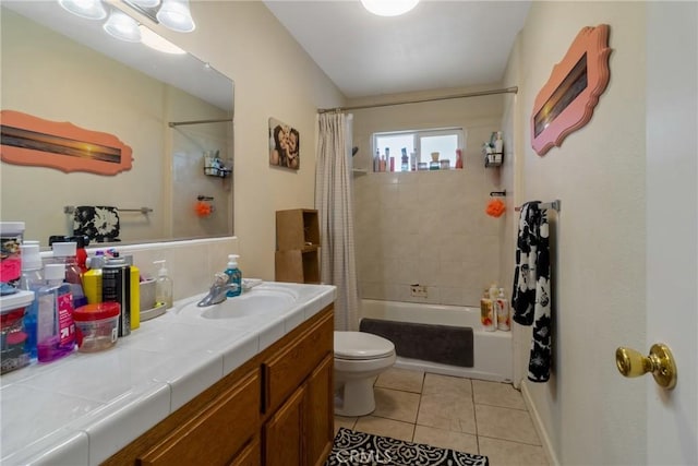 3110 Mckee Rd, Merced, CA 95340 - bathroom with tile patterned floors, toilet, shower / bath combo with shower curtain, and vanity