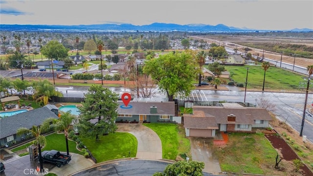 birds eye view of property featuring a residential view and a mountain view