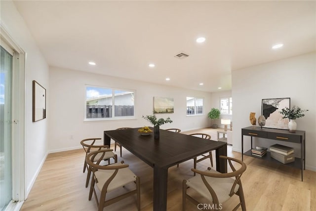 dining room with recessed lighting, light wood-style floors, and visible vents