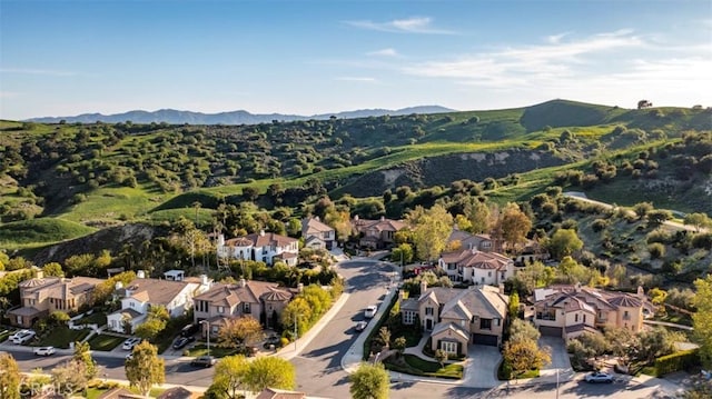 bird's eye view with a residential view and a mountain view