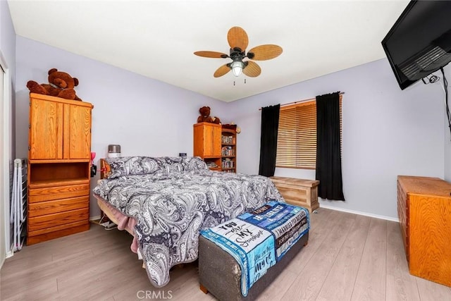 39356 Nicole Dr, Palmdale, CA 93551 - bedroom with light wood-style flooring, ceiling fan, and baseboards