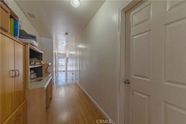 236 N Catalina St, Los Angeles, CA 90004 - hall featuring visible vents, light wood-type flooring, and baseboards