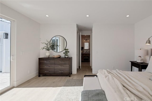 bedroom featuring recessed lighting, light wood-style flooring, and baseboards