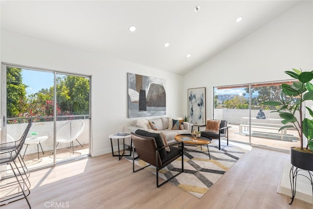 280 S Avenida Caballeros Unit 271, Palm Springs, CA 92262 - living area featuring light wood-style floors, recessed lighting, and high vaulted ceiling
