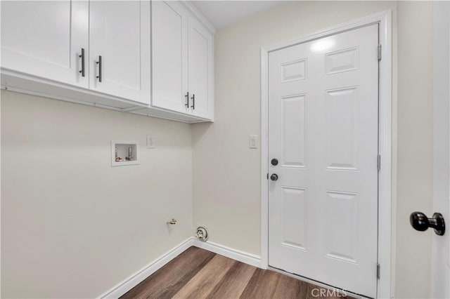 29605 Camino Cristal, Menifee, CA 92584 - clothes washing area with baseboards, hookup for a washing machine, dark wood-style floors, and cabinet space