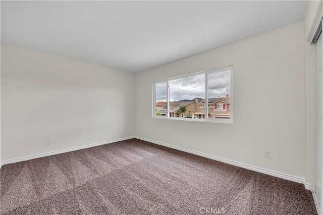 29605 Camino Cristal, Menifee, CA 92584 - spare room featuring baseboards and carpet flooring