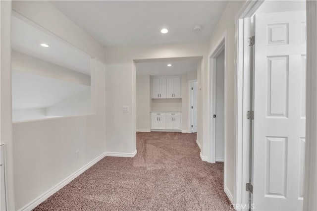 29605 Camino Cristal, Menifee, CA 92584 - corridor with recessed lighting, baseboards, and light carpet