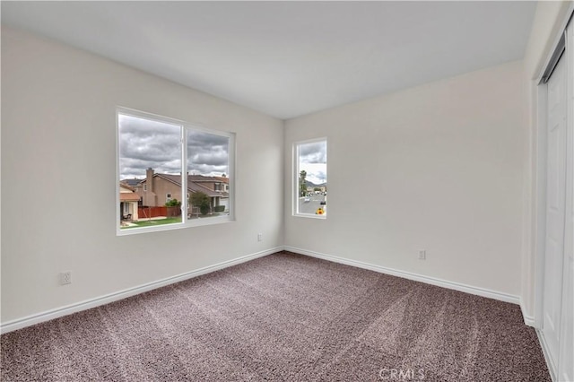 29605 Camino Cristal, Menifee, CA 92584 - empty room with baseboards and carpet