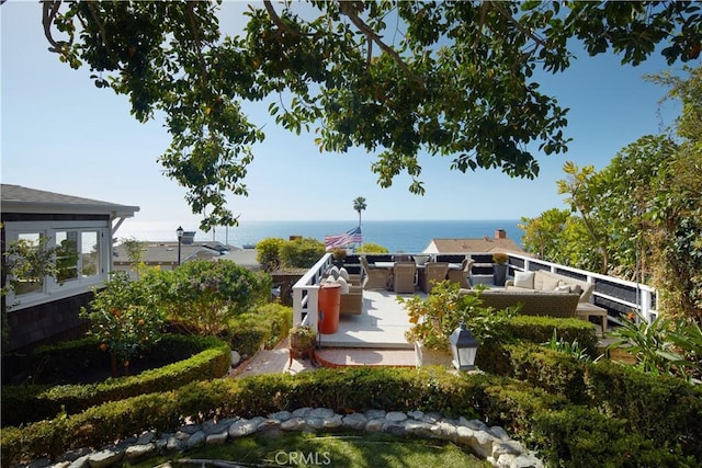 entry to storm shelter with a water view