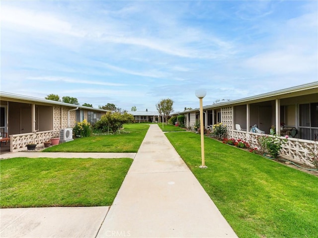 13061 Oak Hill Dr Unit 221B, Seal Beach, CA 90740 - view of community with a yard and ac unit