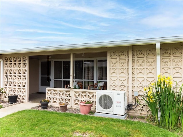 13061 Oak Hill Dr Unit 221B, Seal Beach, CA 90740 - exterior space with ac unit and a yard