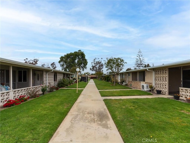 13061 Oak Hill Dr Unit 221B, Seal Beach, CA 90740 - view of property's community featuring a lawn and ac unit
