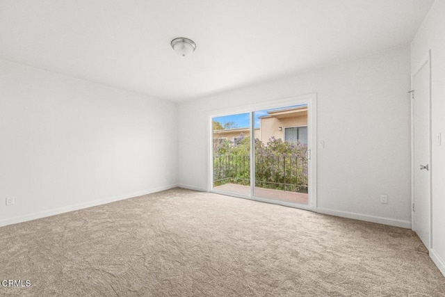 138 S Bryn Mawr St Unit 27, Ventura, CA 93003 - empty room featuring carpet floors and baseboards