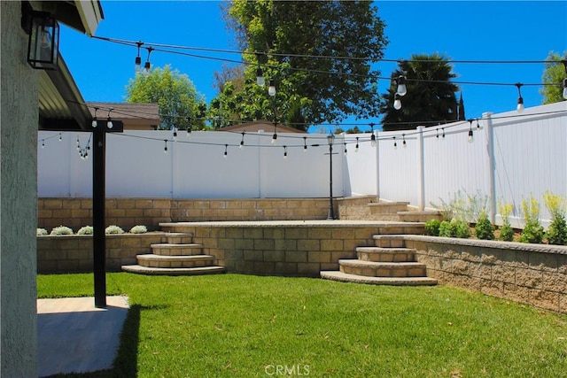 view of yard featuring a fenced backyard