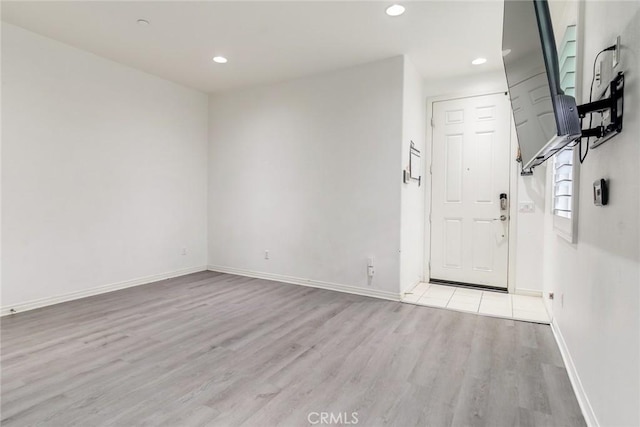 17963 Passionflower Ln, San Bernardino, CA 92407 - spare room featuring wood finished floors, recessed lighting, and baseboards