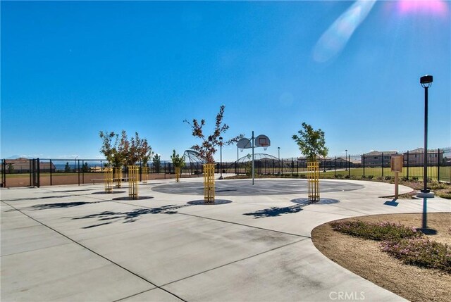 17963 Passionflower Ln, San Bernardino, CA 92407 - view of sport court with fence and community basketball court