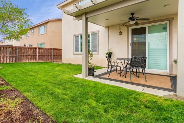 17963 Passionflower Ln, San Bernardino, CA 92407 - view of yard with ceiling fan and a patio