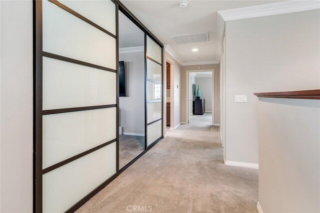 17963 Passionflower Ln, San Bernardino, CA 92407 - hall with ornamental molding, light colored carpet, baseboards, and recessed lighting