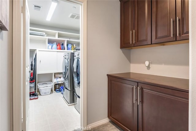 17963 Passionflower Ln, San Bernardino, CA 92407 - washroom with independent washer and dryer, cabinet space, and tile patterned floors