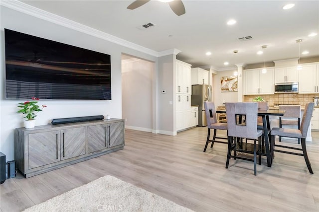 17963 Passionflower Ln, San Bernardino, CA 92407 - dining space featuring crown molding, baseboards, light wood-style floors, recessed lighting, and a ceiling fan