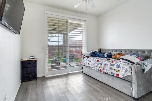 17963 Passionflower Ln, San Bernardino, CA 92407 - bedroom with wood finished floors, baseboards, and ceiling fan