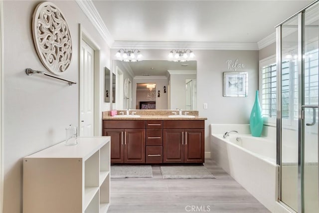 17963 Passionflower Ln, San Bernardino, CA 92407 - full bath with a garden tub, a stall shower, double vanity, ornamental molding, and wood finished floors