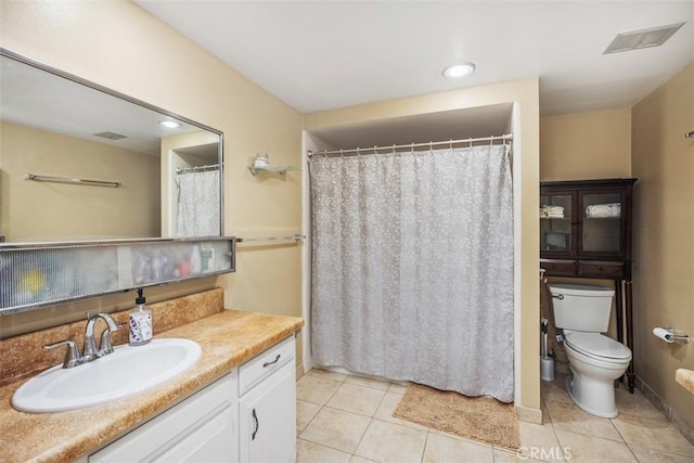 321 Avenida Carmel Unit H, Laguna Woods, CA 92637 - full bathroom with tile patterned floors, vanity, toilet, visible vents, and recessed lighting
