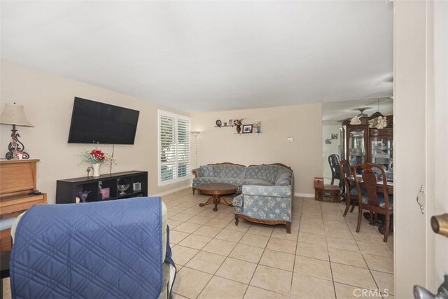 321 Avenida Carmel Unit H, Laguna Woods, CA 92637 - bedroom with baseboards and light tile patterned floors