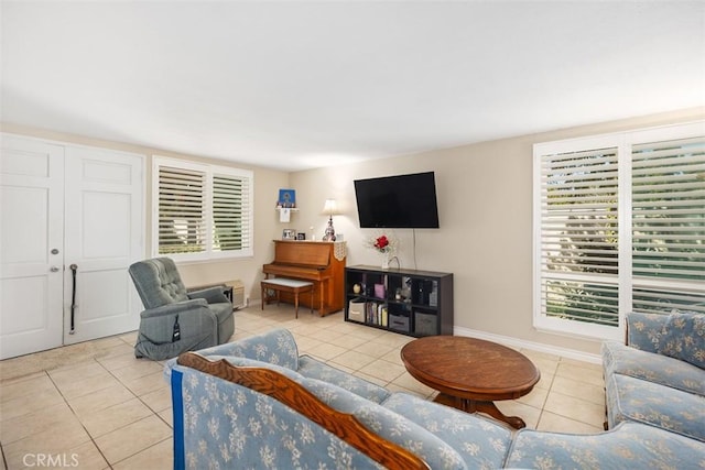 321 Avenida Carmel Unit H, Laguna Woods, CA 92637 - tiled living room featuring baseboards